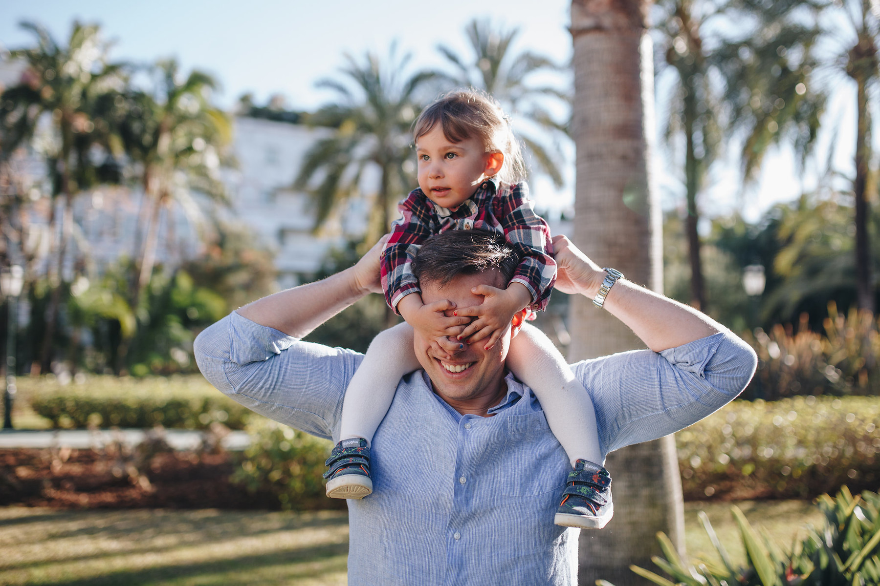 Family photo shooting in the garden in Marbella